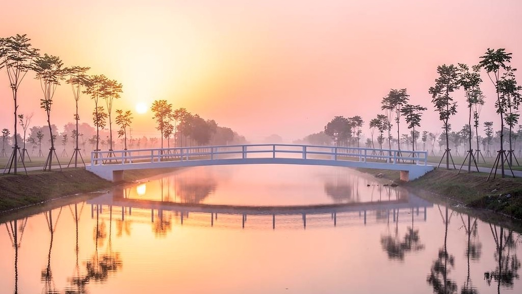 Canal Front at sunrise with reflections in the water